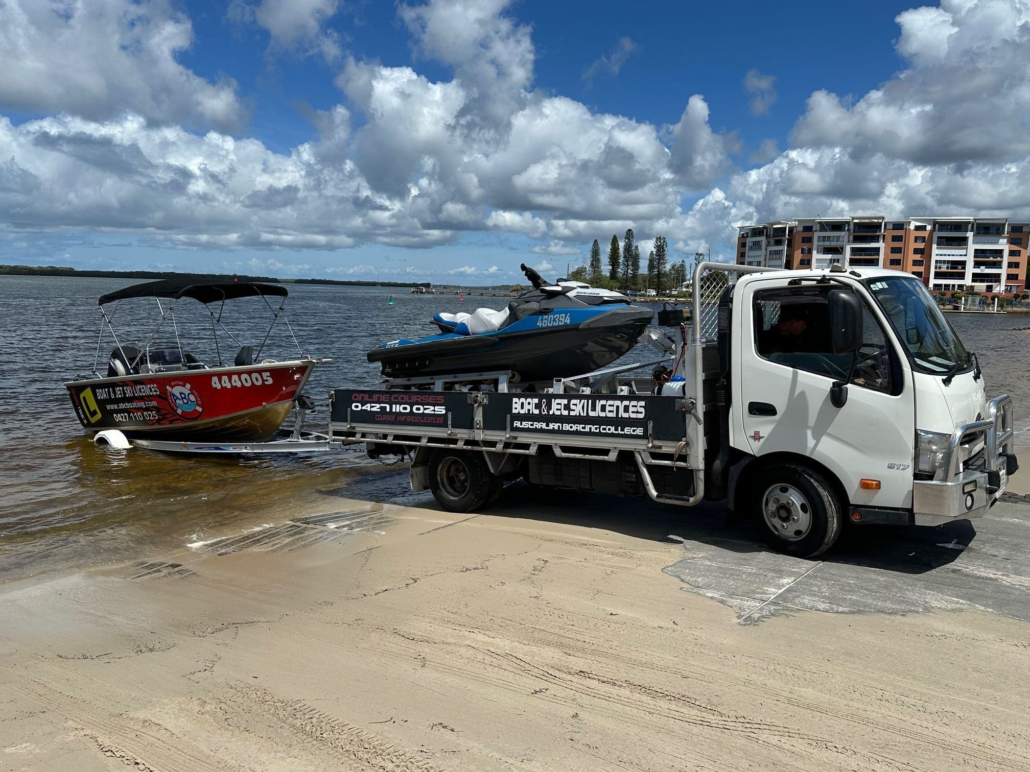 An ABC Boating boat and Sea-Doo jet ski launched together at a Sunshine Coast boat ramp